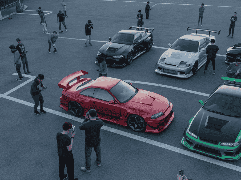 Import experts assisting attendees to purchase JDM cars at the expo